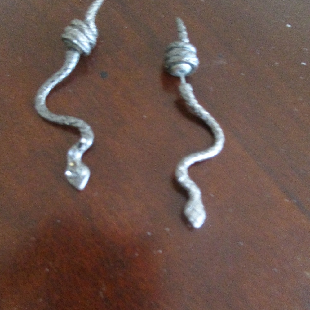 Rachel Roy earrings and vintage 1940's earrings.